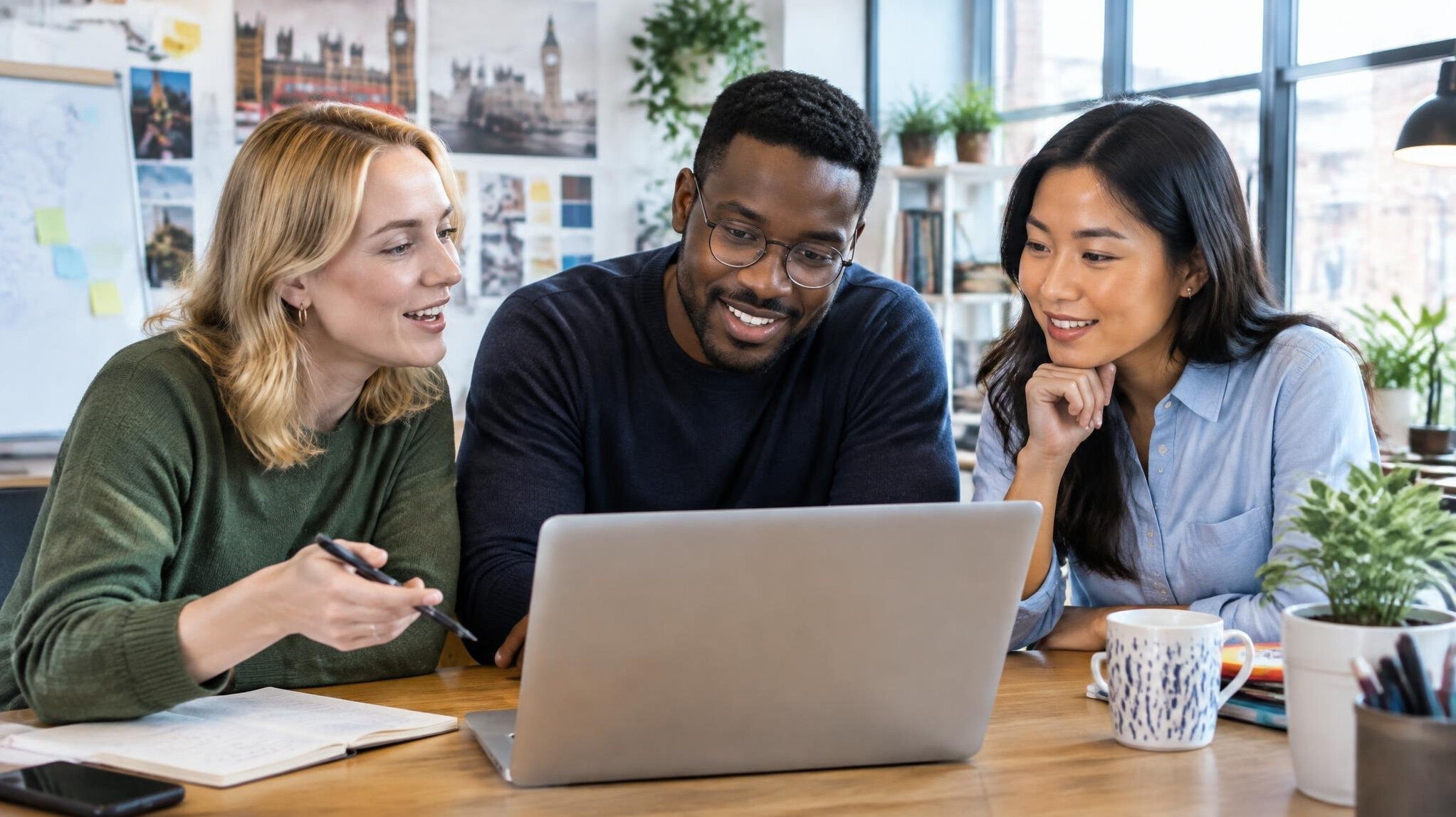 Colleagues collaborating at a shared workspace